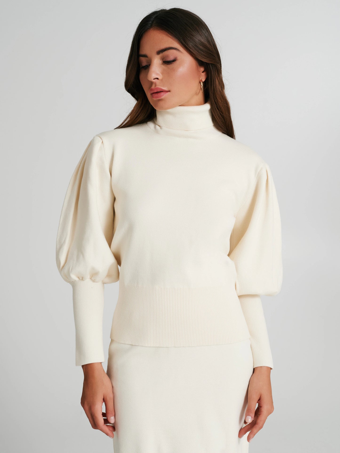 Turtleneck sweater with puff sleeves